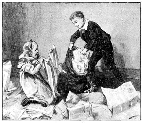 Dora and Harry tearing up the old papers.