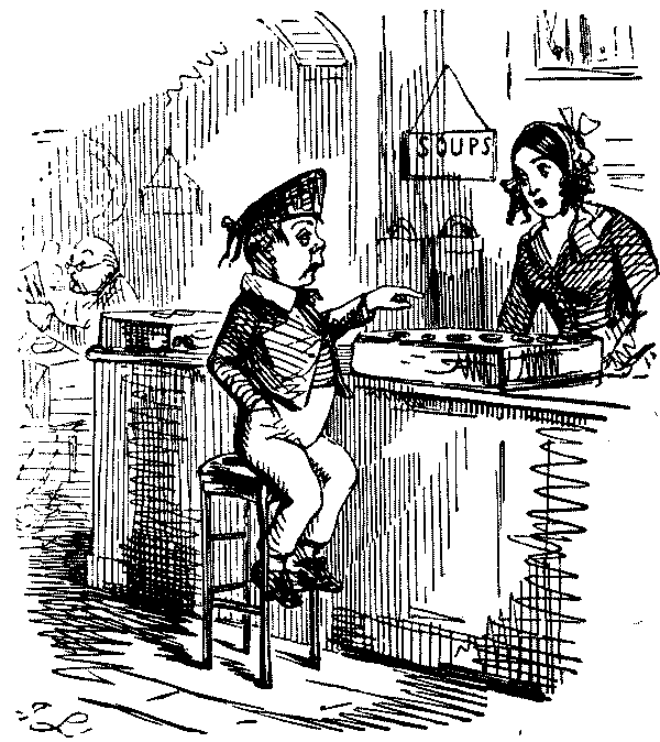 Portly boy talking to shop assistant.