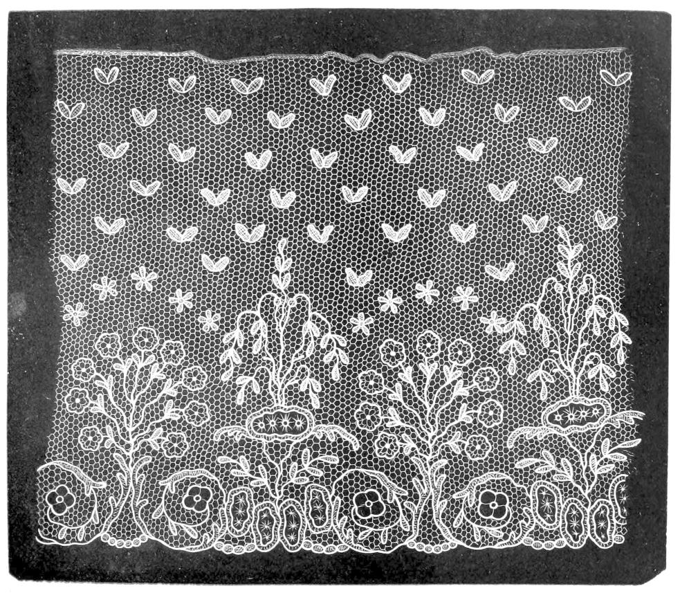 Lace with flowering plants and small     butterflies Lace with flowering plants and small     butterflies