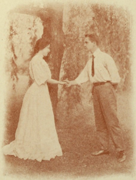 he was shaking hands with her he was shaking hands with her